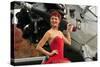 Redhead Pin-Up Girl in 1940's Style Dancer Attire Holding on to a Vintage Aircraft Propeller-null-Stretched Canvas