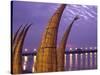 Reed Boats are Stacked Along the Beach at the Fishing Village of Huanchaco in Northern Peru-Andrew Watson-Stretched Canvas