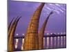 Reed Boats are Stacked Along the Beach at the Fishing Village of Huanchaco in Northern Peru-Andrew Watson-Mounted Premium Photographic Print