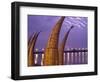 Reed Boats are Stacked Along the Beach at the Fishing Village of Huanchaco in Northern Peru-Andrew Watson-Framed Photographic Print