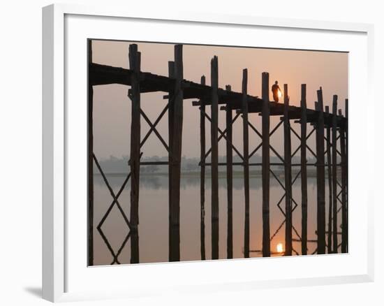 Reflection in Water and Buddhist Monk Silhouetted at Sunrise Crossing U Bein Teak Bridge-Stephen Studd-Framed Photographic Print