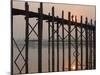 Reflection in Water and Buddhist Monk Silhouetted at Sunrise Crossing U Bein Teak Bridge-Stephen Studd-Mounted Photographic Print