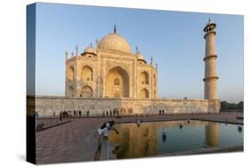 Reflection in Water. Taj Mahal at Sunset. Agra. India-Tom Norring-Stretched Canvas