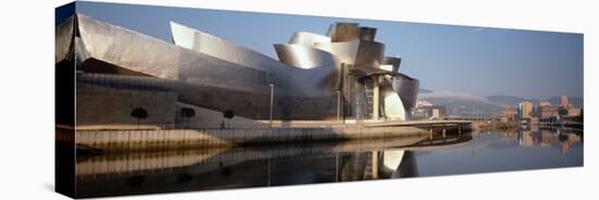 Reflection of a Museum on Water, Guggenheim Musuem, Bilbao, Spain-null-Stretched Canvas