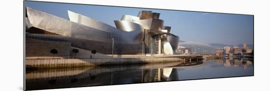 Reflection of a Museum on Water, Guggenheim Musuem, Bilbao, Spain-null-Mounted Photographic Print