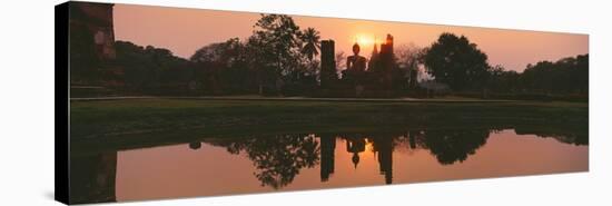 Reflection of Buddha Statue on Water, Sukhothai Historical Park, Sukhothai, Thailand-null-Stretched Canvas