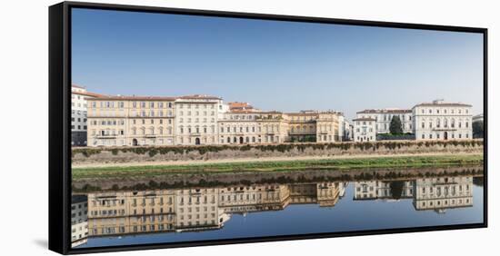 Reflection of buildings on River Arno, Florence, Tuscany, Italy, Europe-Alexandre Rotenberg-Framed Stretched Canvas