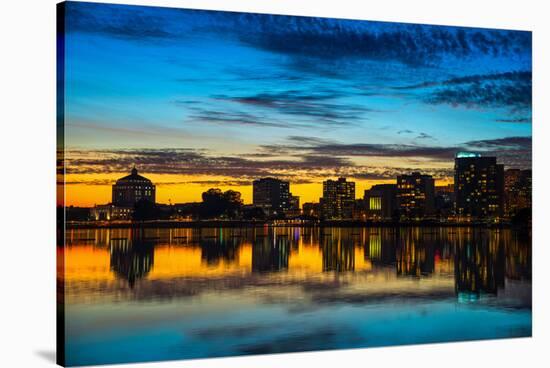 Reflection of buildings on water, Lake Merritt, Oakland, California, USA-null-Stretched Canvas