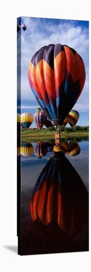 Reflection of Hot Air Balloons in a Lake, Hot Air Balloon Rodeo, Steamboat Springs, Routt County-null-Stretched Canvas