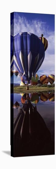 Reflection of Hot Air Balloons in a Lake, Hot Air Balloon Rodeo, Steamboat Springs, Routt County...-null-Stretched Canvas