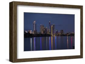 Reflection of illuminated skylines on water, Coral Sea, Surfer's Paradise, Gold Coast, Queenslan...-Panoramic Images-Framed Photographic Print