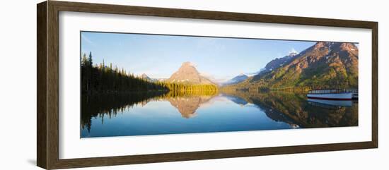 Reflection of mountains in Two Medicine Lake, Glacier National Park, Montana, USA-null-Framed Photographic Print