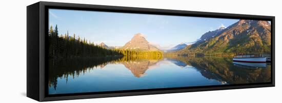 Reflection of mountains in Two Medicine Lake, Glacier National Park, Montana, USA-null-Framed Stretched Canvas