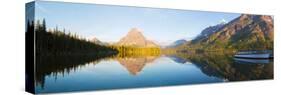 Reflection of mountains in Two Medicine Lake, Glacier National Park, Montana, USA-null-Stretched Canvas