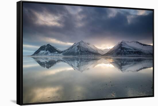 Reflection of mountains on ocean at sunset in Vatnajokull National Park in eastern Iceland-Alex Saberi-Framed Stretched Canvas