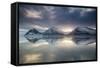 Reflection of mountains on ocean at sunset in Vatnajokull National Park in eastern Iceland-Alex Saberi-Framed Stretched Canvas