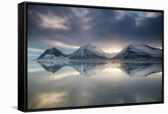 Reflection of mountains on ocean at sunset in Vatnajokull National Park in eastern Iceland-Alex Saberi-Framed Stretched Canvas