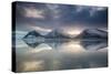 Reflection of mountains on ocean at sunset in Vatnajokull National Park in eastern Iceland-Alex Saberi-Stretched Canvas