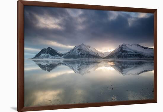 Reflection of mountains on ocean at sunset in Vatnajokull National Park in eastern Iceland-Alex Saberi-Framed Photographic Print