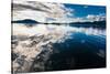 Reflections in the calm waters of the Inside Passage, Southeast Alaska, USA-Mark A Johnson-Stretched Canvas