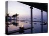 Reflections in the Still Water of the Infinity Pool at Sunset, at the Chedi Hotel-John Warburton-lee-Stretched Canvas