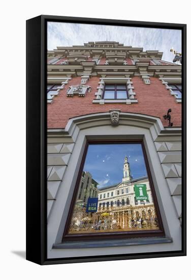 Reflections of Downtown in Shop Window, Riga, Latvia, Europe-Michael-Framed Stretched Canvas