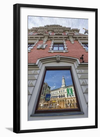 Reflections of Downtown in Shop Window, Riga, Latvia, Europe-Michael-Framed Photographic Print