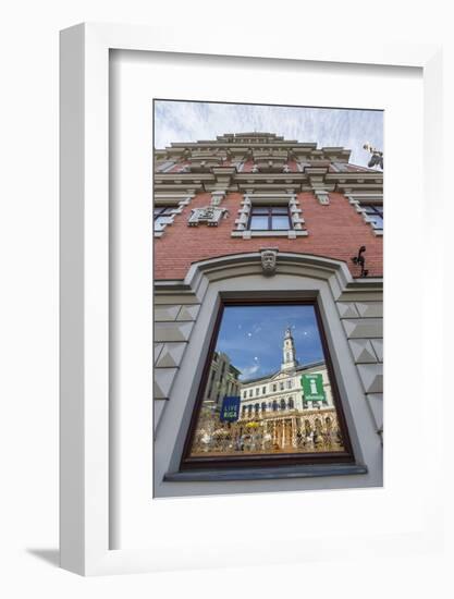 Reflections of Downtown in Shop Window, Riga, Latvia, Europe-Michael-Framed Photographic Print