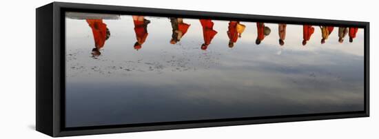 Reflections of Hindu Holy Men Arriving on the Banks of the Ganges River for a Holy Dip, India-null-Framed Stretched Canvas