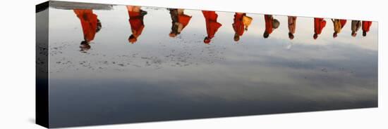 Reflections of Hindu Holy Men Arriving on the Banks of the Ganges River for a Holy Dip, India-null-Stretched Canvas