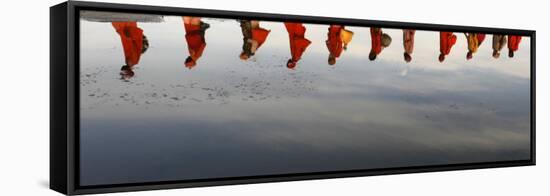 Reflections of Hindu Holy Men Arriving on the Banks of the Ganges River for a Holy Dip, India-null-Framed Stretched Canvas