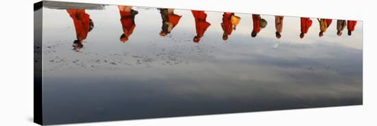 Reflections of Hindu Holy Men Arriving on the Banks of the Ganges River for a Holy Dip, India-null-Stretched Canvas