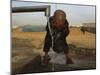 Refugee Washes His Face in a Refugee Camp in the Outskirts of Kabul, Afghanistan-null-Mounted Photographic Print