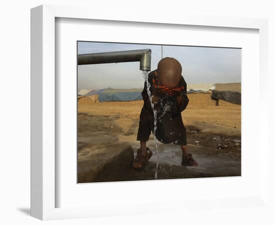 Refugee Washes His Face in a Refugee Camp in the Outskirts of Kabul, Afghanistan-null-Framed Photographic Print