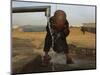 Refugee Washes His Face in a Refugee Camp in the Outskirts of Kabul, Afghanistan-null-Mounted Photographic Print