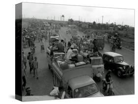 Refugees Fleeing the Advance of Communist Forces Pour into Saigon-null-Stretched Canvas