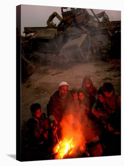 Refugees Light a Fire with Plastic and Rubbish Next to Tent in Junk Dump in Kabul, Afghanistan-null-Stretched Canvas