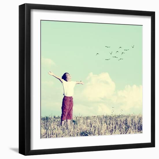 Relaxed Boy Breathing Fresh Air on a Meadow with Birds Flying in Background Sky-zurijeta-Framed Photographic Print