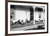 Relaxed Dogs Lounge on a Farmhouse Porch, Ca. 1905-null-Framed Photographic Print