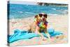 Relaxing Dog At The Beach With Flowers Garland-Ivonnewierink-Stretched Canvas