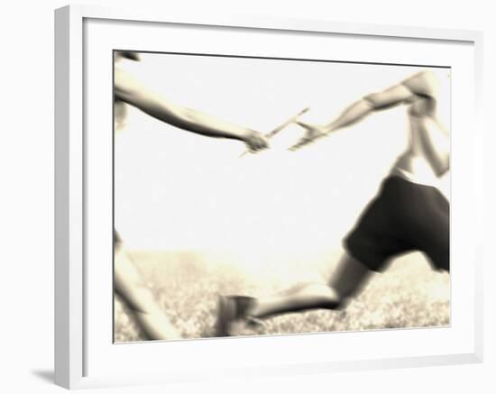 Relay Racers Handing Off the Baton-null-Framed Photographic Print