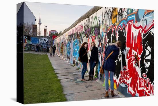 Remains of the Berlin Wall at the East Side Gallery in Berlin, Germany-null-Stretched Canvas