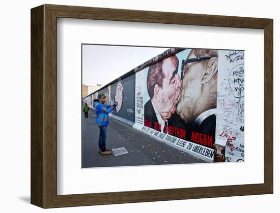 Remains of the Berlin Wall at the East Side Gallery in Berlin, Germany-null-Framed Art Print