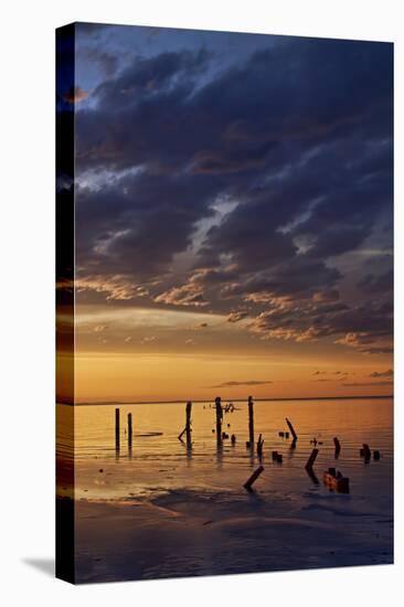 Remnants of an Old Pier Poke Out at the Great Salt Lake in Utah Near Saltair-Clint Losee-Stretched Canvas