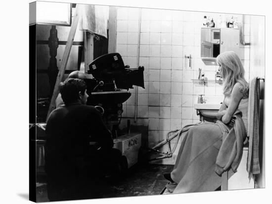 REPULSION, 1965 directed by ROMAN POLANSKI On the set, Roman Polanski and Catherine Deneuve (b/w ph-null-Stretched Canvas