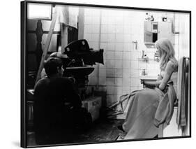 REPULSION, 1965 directed by ROMAN POLANSKI On the set, Roman Polanski and Catherine Deneuve (b/w ph-null-Framed Photo