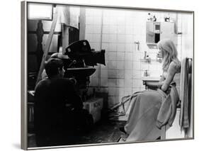 REPULSION, 1965 directed by ROMAN POLANSKI On the set, Roman Polanski and Catherine Deneuve (b/w ph-null-Framed Photo