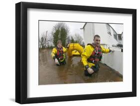 Rescue Workers Entering Property with Inflatable Raft to Check on Home Owners-David Woodfall-Framed Photographic Print