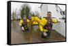 Rescue Workers Entering Property with Inflatable Raft to Check on Home Owners-David Woodfall-Framed Stretched Canvas