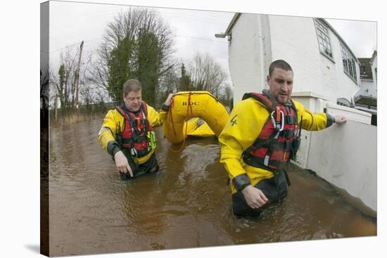 Rescue Workers Entering Property with Inflatable Raft to Check on Home Owners-David Woodfall-Stretched Canvas